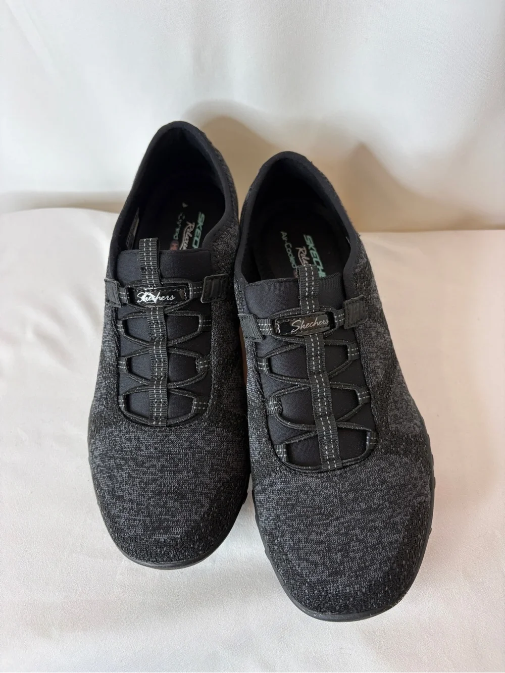Skechers Women's Black Knit Slip-On Sneakers